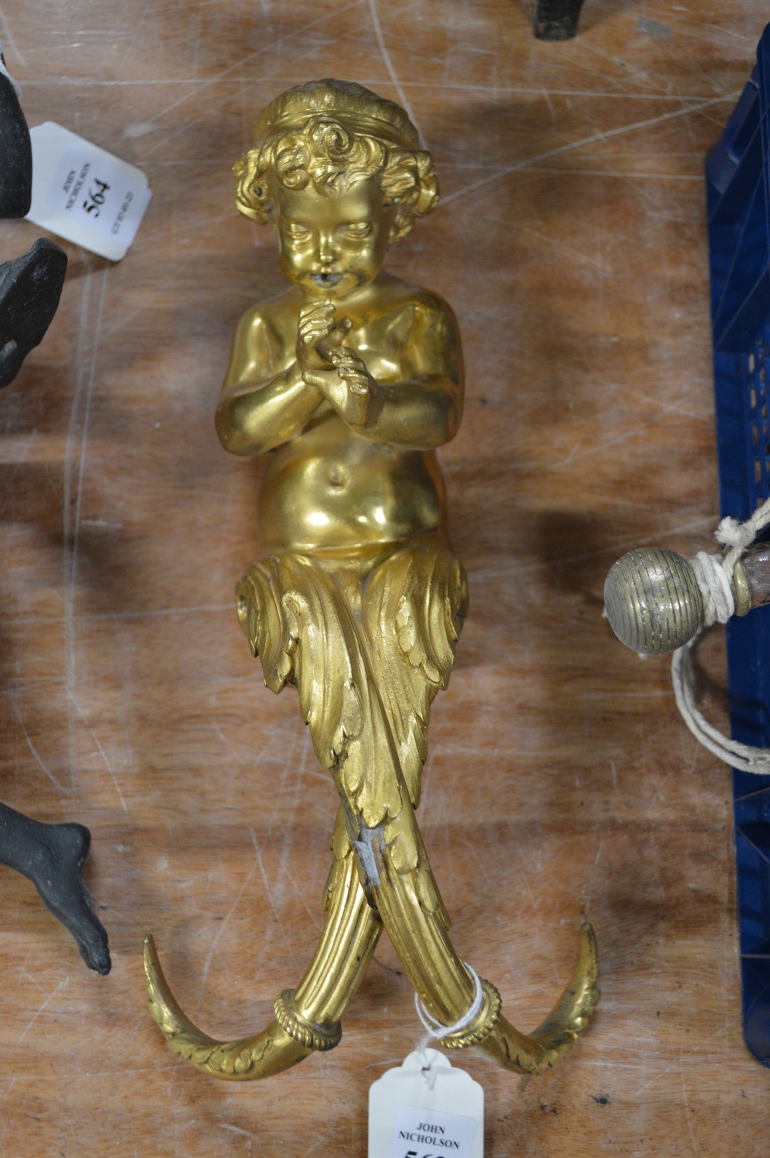 An ormolu bronze cherub mount.