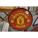 A cast iron sign Manchester United.