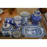 A collection of Chinese blue and white items to include a small dish, tankard, teapot etc.