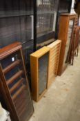 Four various wall hanging display cabinets.