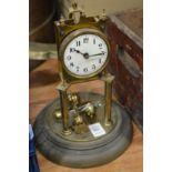 A brass anniversary clock (lacking shade).