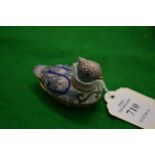 A small cloisonne duck.