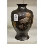 A good Japanese bronze, silver and copper vase.