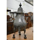 A pewter hot water urn.