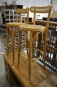 Two bentwood bar stools.