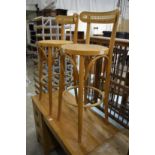 Two bentwood bar stools.