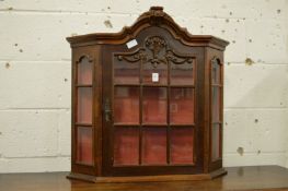 A Dutch style mahogany hanging display cabinet.