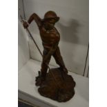 J Dalbreuse, a bronze sculpture of a fishermen holding a net.