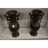 A pair of Japanese bronze vases.