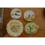 A pair of Doulton saucers painted with game birds, a novelty cruet and a Bunnykins dish.