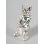 A SILVER PIG SWAG BAG VESTA.