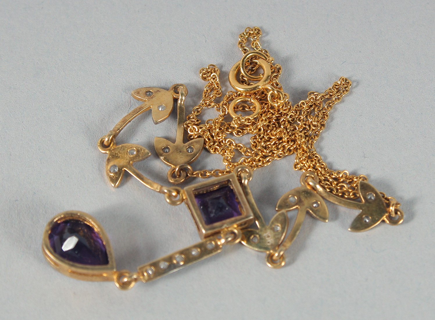 A 9ct. GOLD AND SILVER AMETHYST AND DIAMOND NECKLACE. - Image 2 of 2