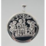 A SILVER AND ONYX CUPID PENDANT. 4cm