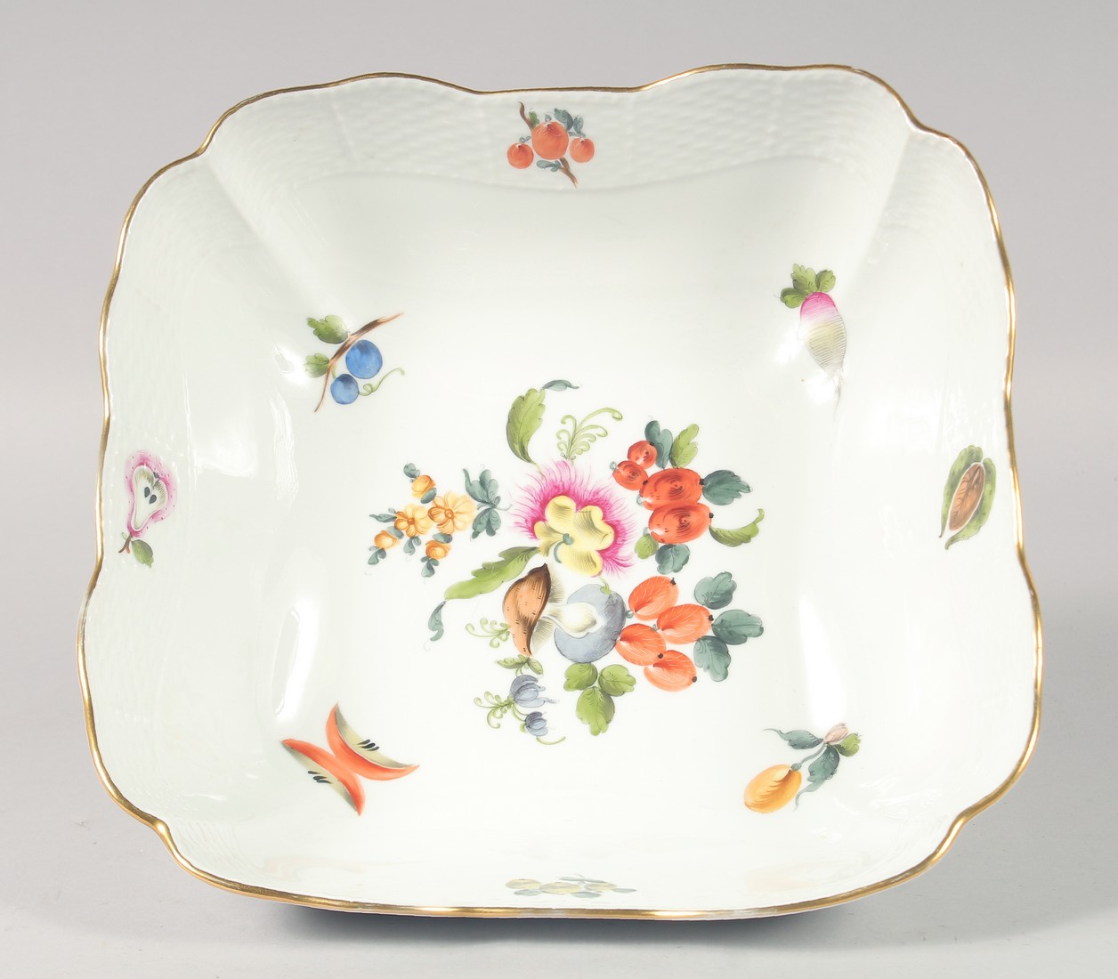 A HEREND SQUARE FRUIT BOWL painted with fruits and nuts. No. 180 BFR. 10ins wide.