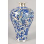A CHINESE SILVERED BLUE AND WHITE PORCELAIN VASE, six-character mark to base, 30cm high.