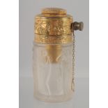 A LALIQUE OPAQUE GLASS PERFUME BOTTLE, moulded with female figures, with an engraved gilt metal