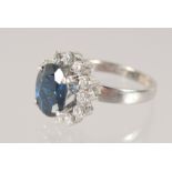 A GOOD 18CT WHITE GOLD SAPPHIRE AND DIAMOND RING.