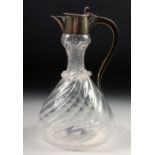 A SILVER MOUNTED MOULDED GLASS CLARET JUG, London, 1889. 9" high