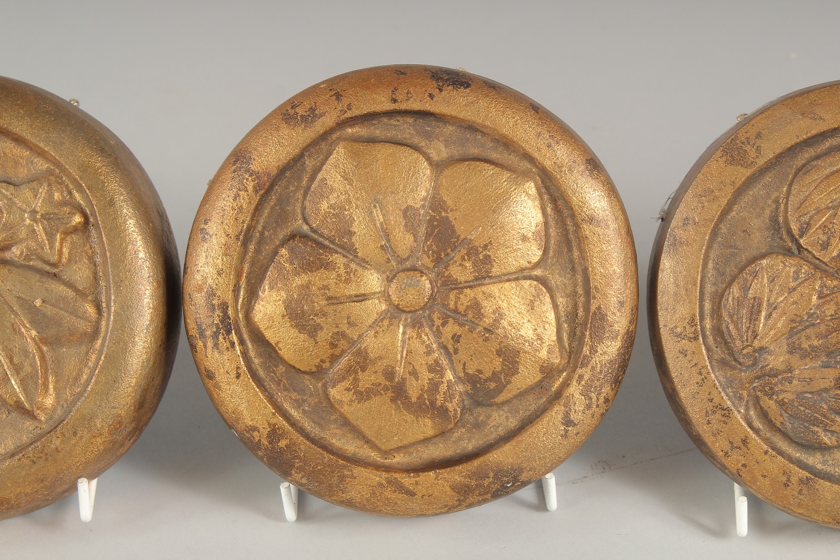 FOUR JAPANESE GILDED CAST METAL HANGING MON, each 15cm diameter, (4). - Image 3 of 6