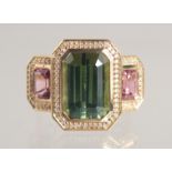 A VERY FINE NATURAL GREEN TOURMALINE AND PINK TOURMALINE RING, 18CT GOLD.