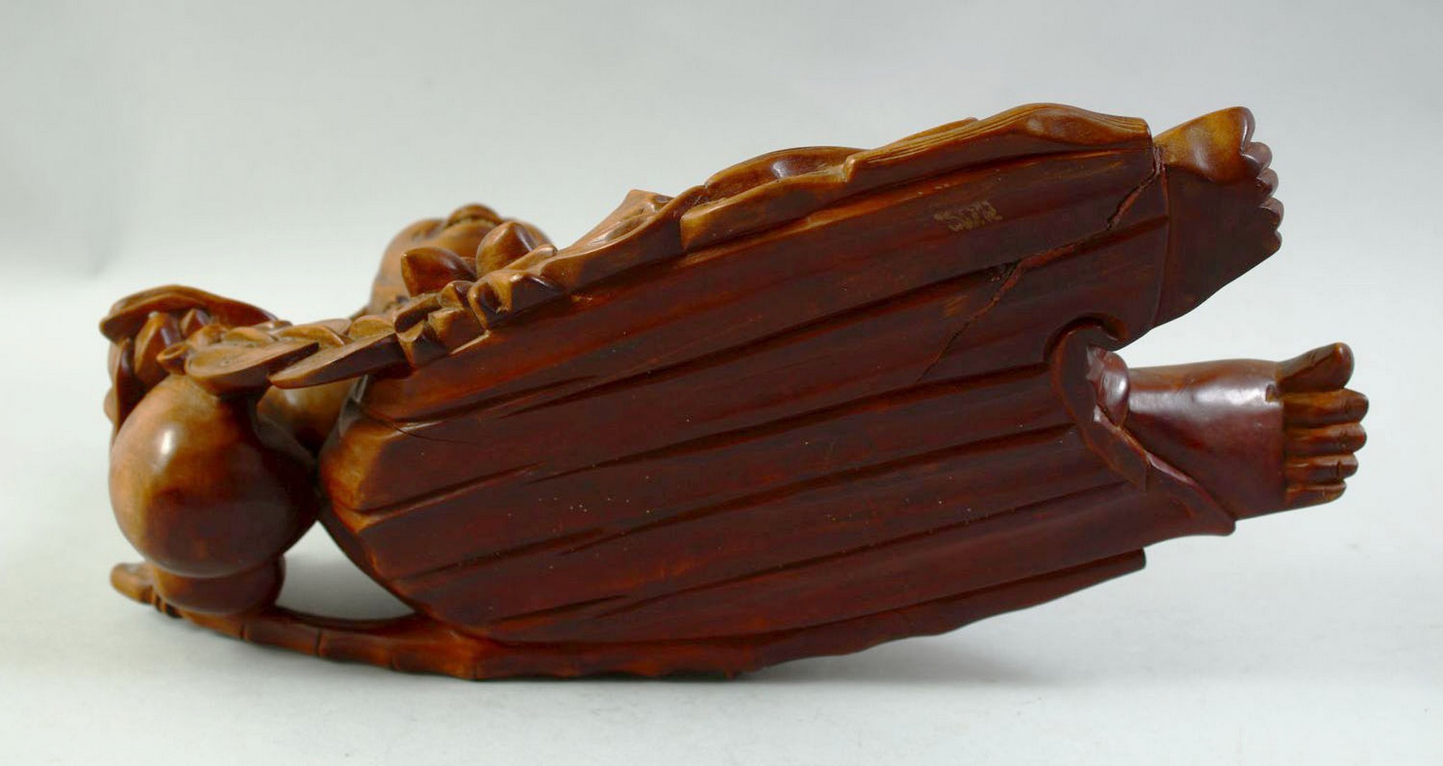 A LARGE CARVED HARDWOOD HOTEI, on a fitted carved hardwood stand, the figure reclining with a - Image 3 of 7