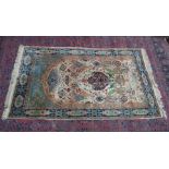 A PERSIAN CARPET, cream ground with stylised decoration depicting birds and an archway 7'9" x 4'6"