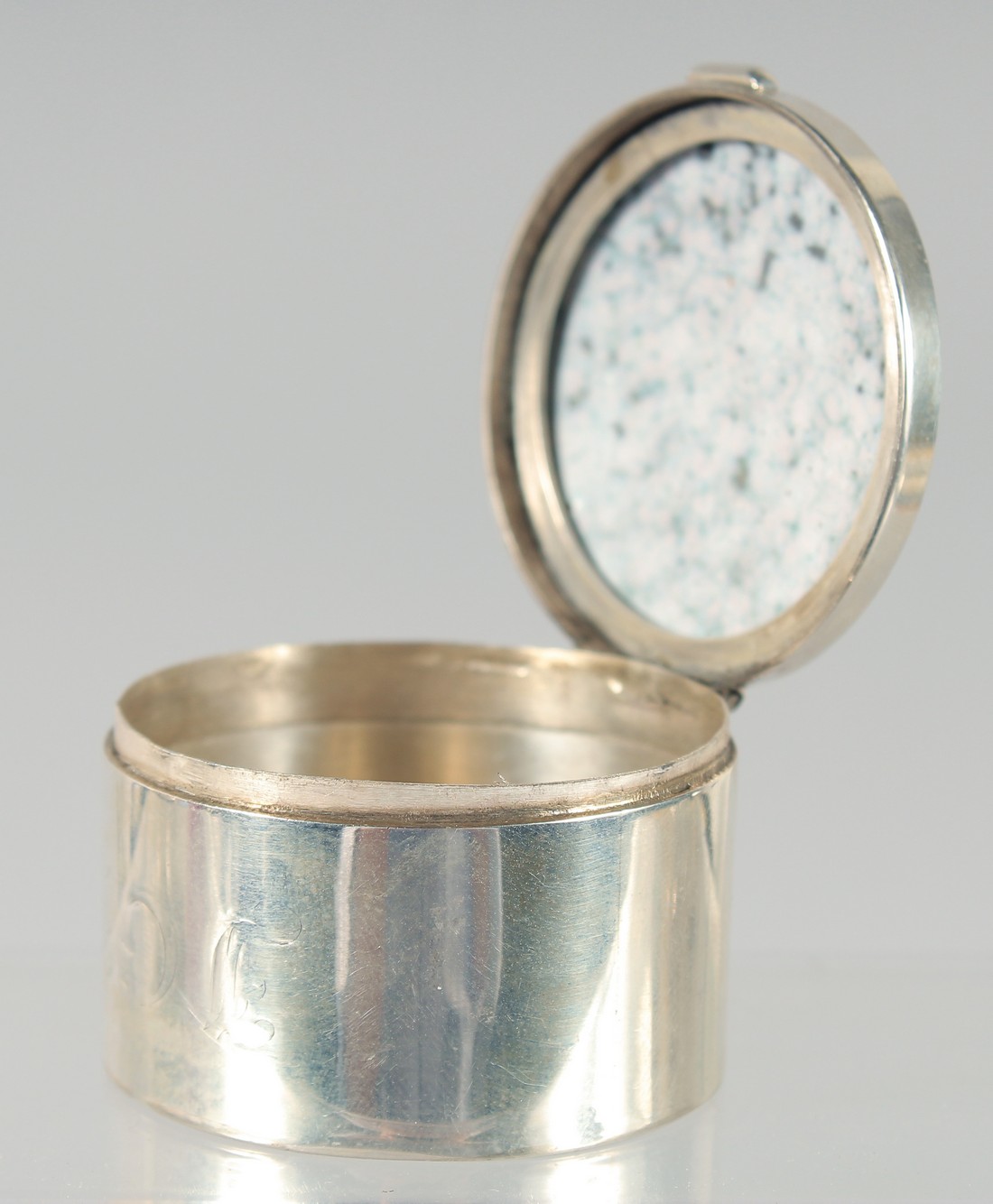 A CIRCULAR SILVER BOX AND COVER, enamel of a young lady. 4cm - Image 2 of 2