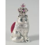 A CAST SILVER CAT WITH CROWN PIN CUSHION. 3.5cm