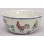 A SMALL CHINESE DOUCAI CHICKEN CUP.