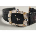 A GENTLEMAN'S 18K WHITE GOLD SAPPHIRE SET WRISTWATCH with leather strap. No. 1631 185 0.750