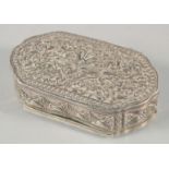 A FINE 19TH CENTURY SRI LANKAN SILVER BOX, with embossed foliate decoration, weight 55g, 9cm x 5cm.