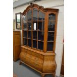 A GOOD DUTCH MARQUETRY INLAID WALNUT BOMBE DISPLAY CABINET ON CHEST.