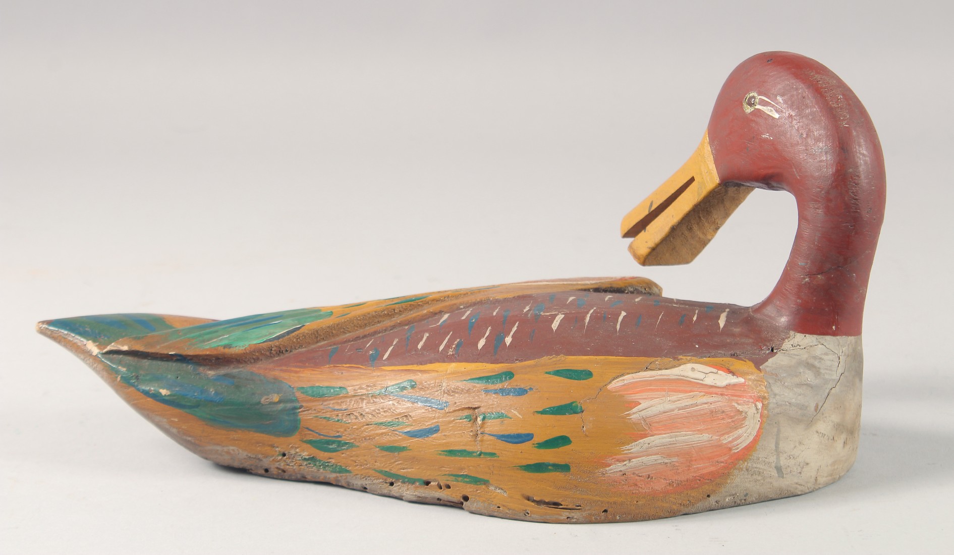 A PAINTED DECOY DUCK. 12ins long. - Image 2 of 2