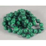 A MALACHITE BEAD NECKLACE. 84cm long