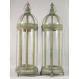 A LARGE PAIR OF ORNATE CIRCULAR LANTERNS with verdigris patination. 35ins high
