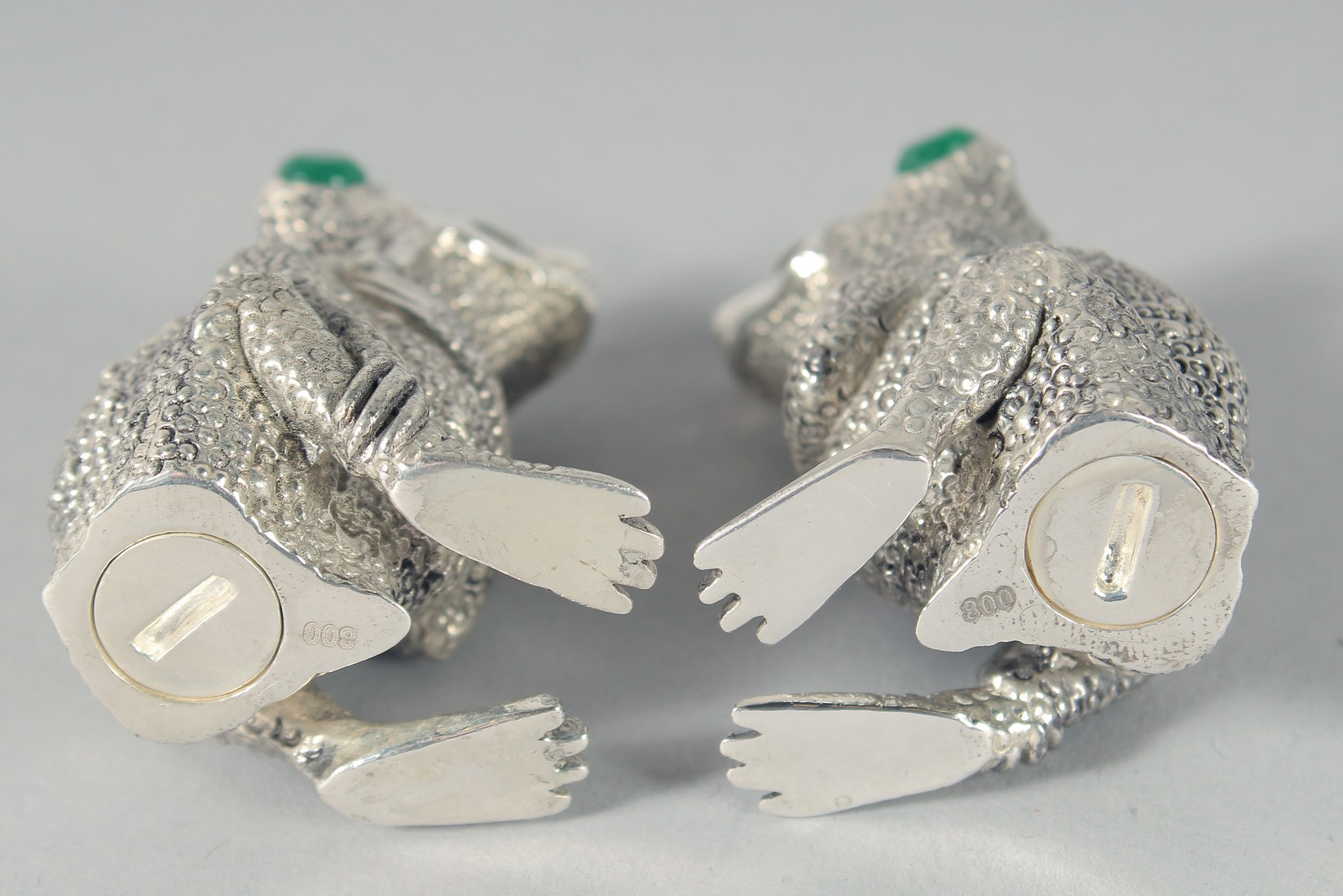 A PAIR OF SILVER-PLATED FROG SALT AND PEPPERS. 5cm - Image 2 of 2