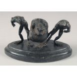 A 19TH CENTURY FRENCH BRONZE FROG AND SNAIL INKWELL on an oval marble base. 6ins long.