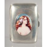 A SILVER CIGARETTE CASE, with later oval enamel of a naked female bust. 8cm x 5.5cm