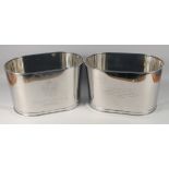 A PAIR OF OVAL METAL CHAMPAGNE COOLERS. 17" long