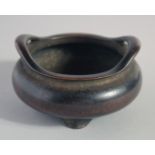 A GOOD CHINESE BRONZE TRIPOD CENSER, with six-character mark to base. 11.5cm diameter.