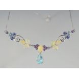 A SILVER OPAL, BLUE TOPAZ, IOLITE AND AMETHYST NECKLACE.