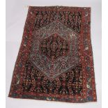 AGOOD PERSIAN CARPET, pale blue ground, with all over stylised decoration. 6'5" x 4'4"