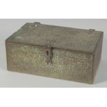 A 19TH CENTURY SYRIAN DAMASCUS ENGRAVED BRASS QURAN BOX, with panels of calligraphy, 14cm x 9cm.