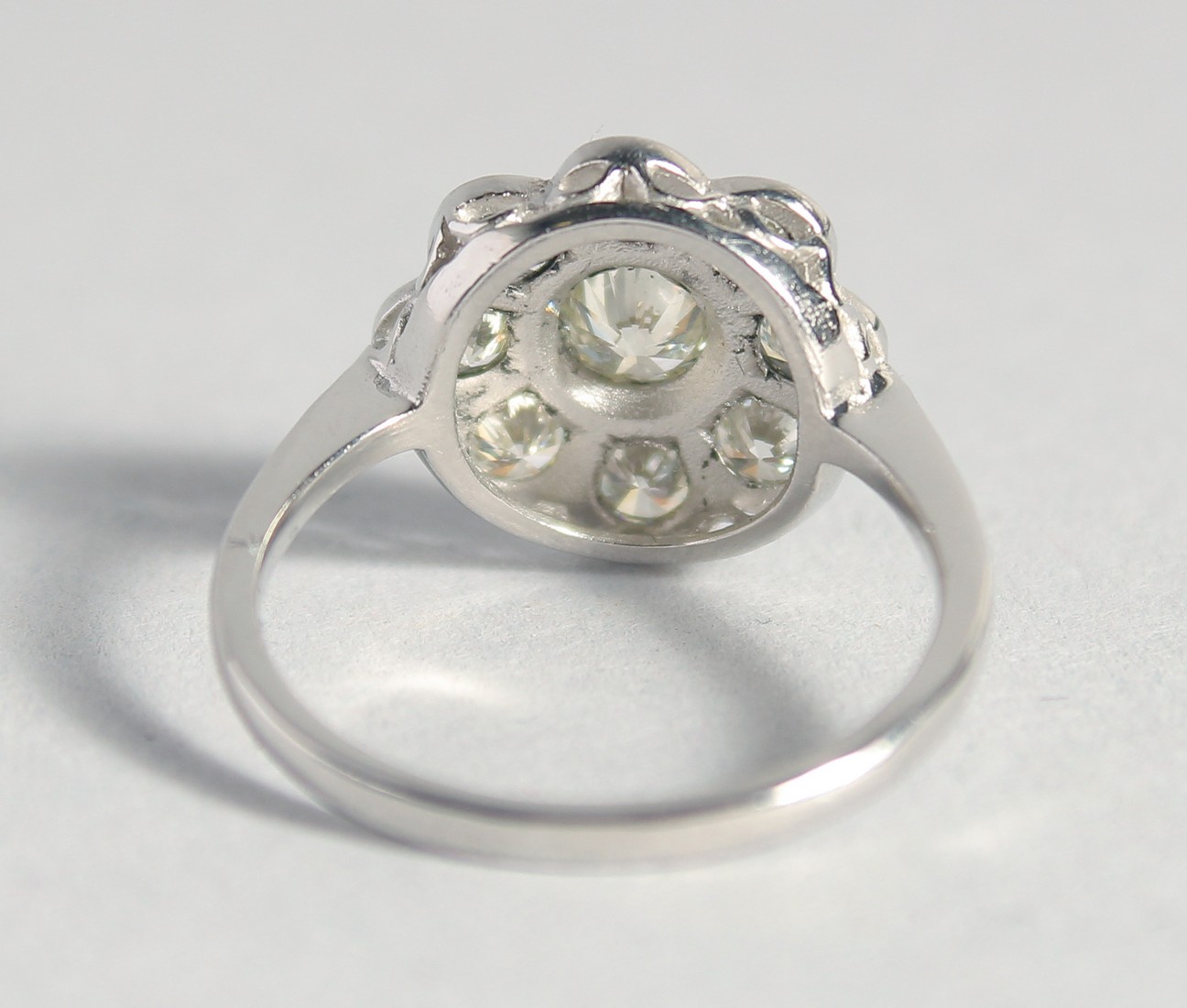 A SUPERB PLATINUM AND DIAMOND CLUSTER RING. - Image 3 of 3