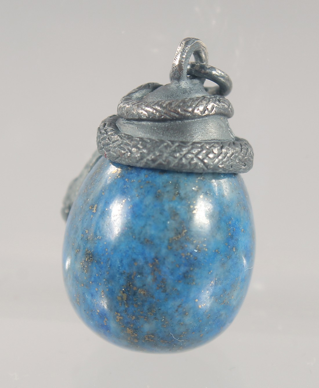 A SILVER MOUNTED LAPIS EGG SHAPED PENDANT. 3cm high - Image 2 of 2