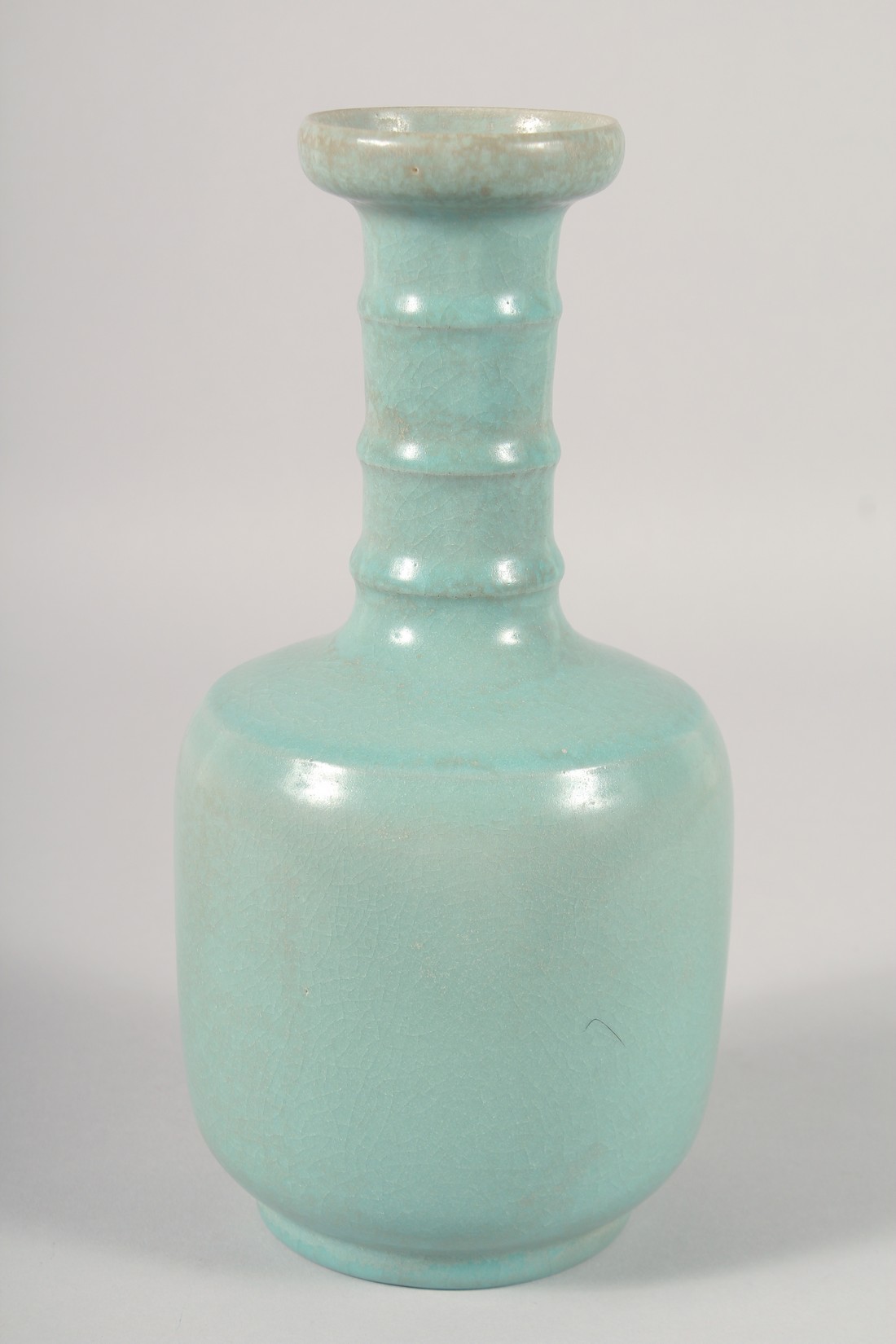 A CHINESE CELADON GLAZE VASE, with ribbed neck, 25.5cm high. - Image 2 of 5