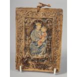 A MAJOLICA POTTERY MADONNA AND CHILD 5.75ins high.