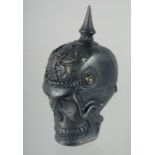 A BRASS SKULL VESTA. 6cm