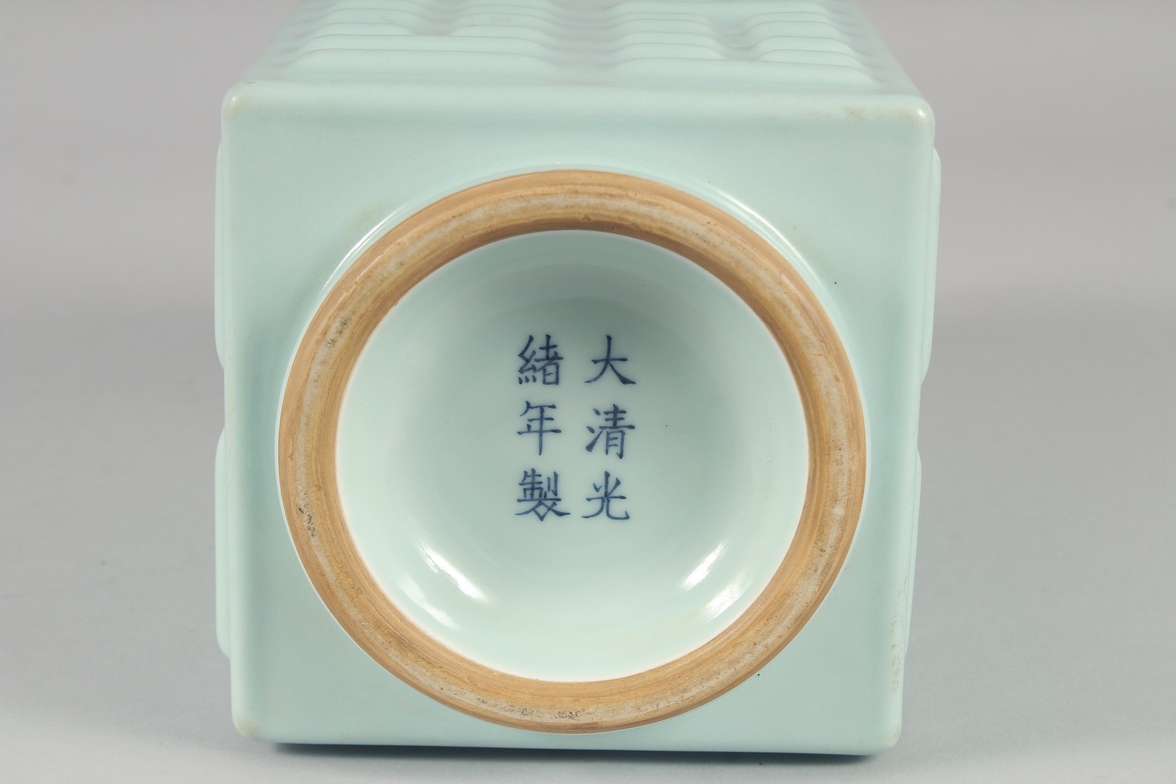 A CHINESE CELADON GLAZE SQUARE FORM ZUN VASE, the base with six-character mark, 27.5cm high. - Image 6 of 6