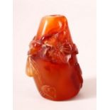A CHINESE CARVED AGATE SNUFF BOTTLE. 5.5cm.